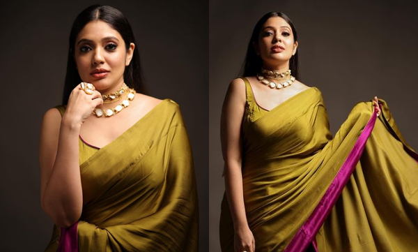 veena-nandakumar-wearing-olive-green-silk-saree