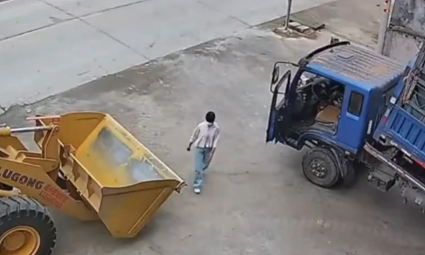 video-of-woman-using-hand-brake-after-jumping-into-a-truck-running-without-a-driver-goes-viral
