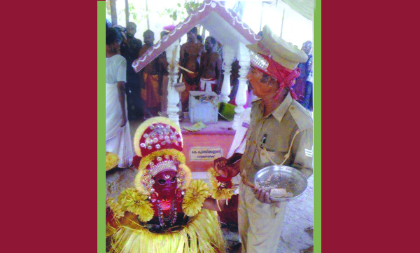Sreekarinjamundi Devi and The Police Theyyam
