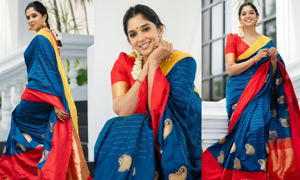Nyla Usha look stunning in blue pattu saree
