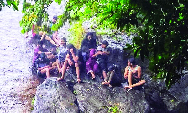 Tourists trapped in Idukki Thommankuth were rescued by elephant jumping