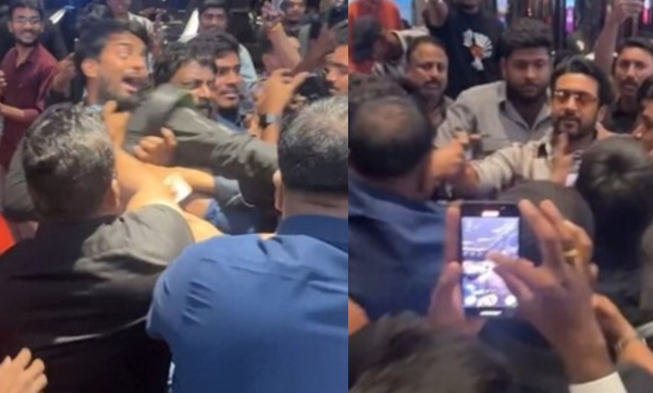 suriya-helps-fan-take-a-selfie-after-security-personnel-pushed-away