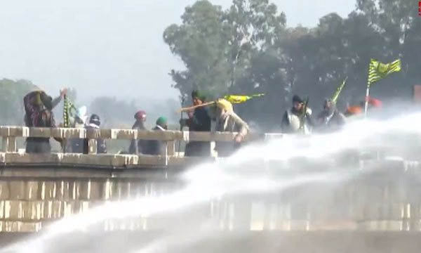 Cops Fire Tear Gas, Use Water Cannon