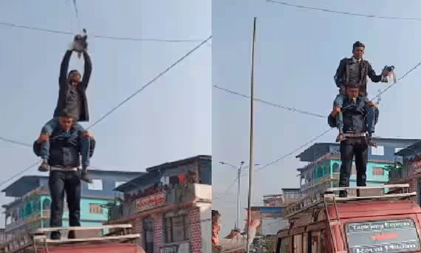 men-climb-eachother-to-save-a-pigeon-tangled-in-wires-video