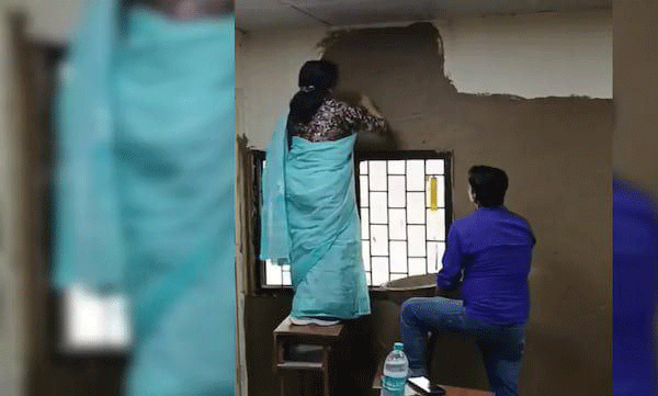 video-delhi-college-principal-paints-classroom-wall-with-cow-dung