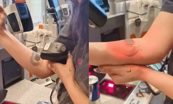 woman-gets-red-bull-barcode-tattooed-on-hand-it-actually-scans-at-grocery-store