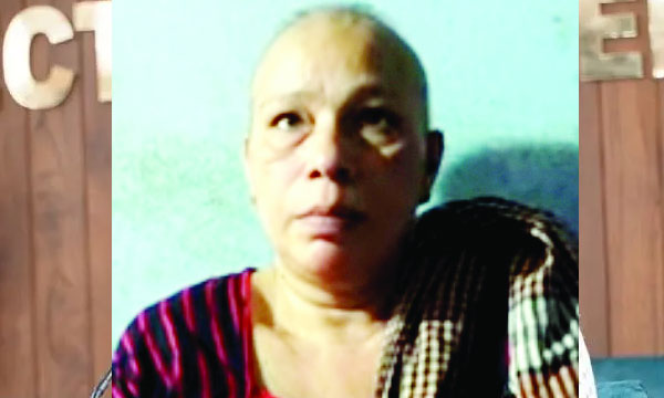 A housewife who was suffering from cancer was tied to her bed and robbed of money