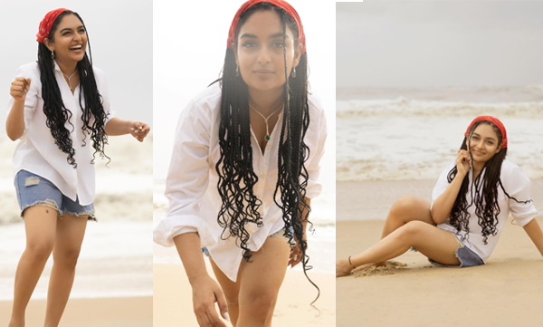 Prayaga Martin enjoys beach with pet dog