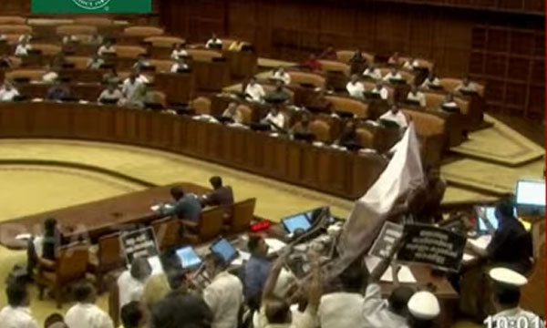 Protests in and outside the House over the gold chain controversy; Opposition demands resignation of Devaswom Minister