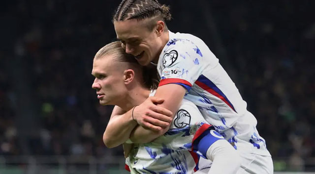 Erling Haaland scored two goals in as many minutes as Norway cemented their return to a World Cup 