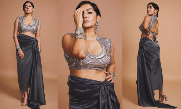 Parvathy Thiruvoth looks hot in a metallic zari saree with a deep neck metallic embroidered blouse