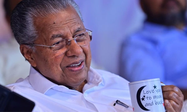 'Love you to the moon and back'; CM holds cup with survivor's words printed on it