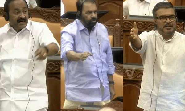 The Opposition raised placards featuring the Chief Minister and Potti