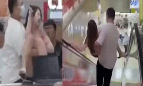 man-carries-wife-on-shoulder-after-she-secretly-tries-to-sell-phone-bought-on-installments