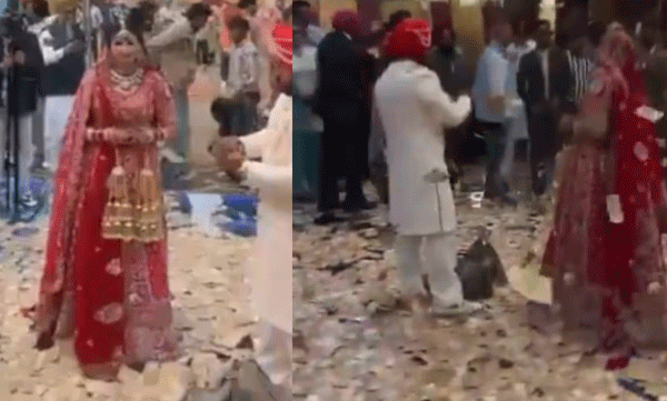 grooms-family-showering-bride-with-cash-viral-video