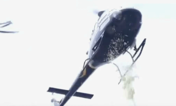 viral-video-husband-showers-flowers-from-helicopter-for-baby-shower