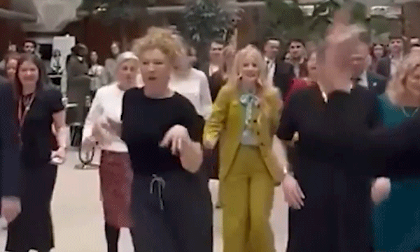 while-the-world-is-on-the-verge-of-war-mps-dance-in-the-british-parliament