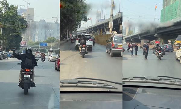 A bike rider appeared and started helping the ambulance clear the way