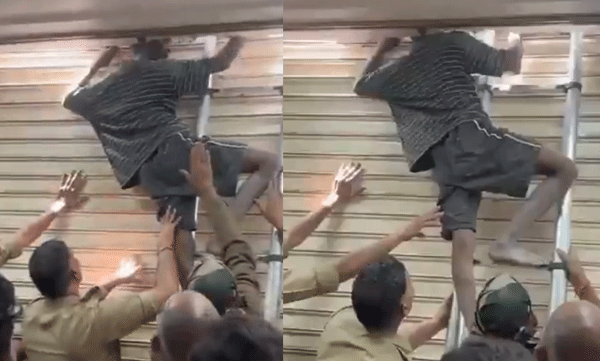 video-of-thief-getting-his-head-stuck-between-shutter-and-wall-goes-viral