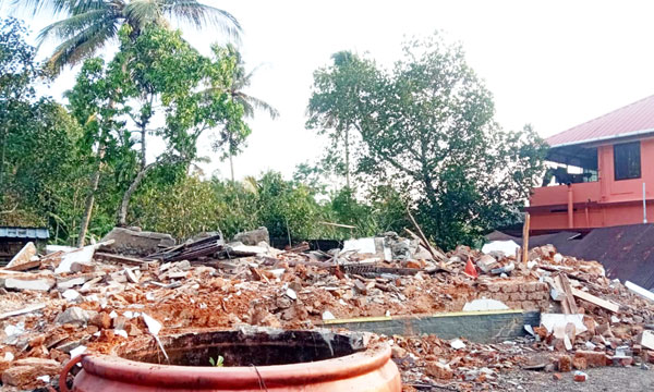 Kaduthuruthy Urban Bank Demolishes Foreclosed House Using JCB
