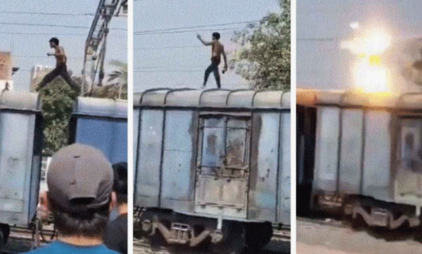 shocking-video-man-climbs-on-top-of-train-grabs-overhead-electric-wire
