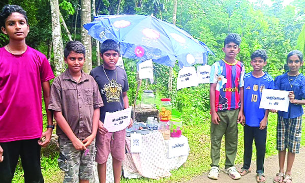 Having started a roadside juice stall, the children of Manalunkal are busy
