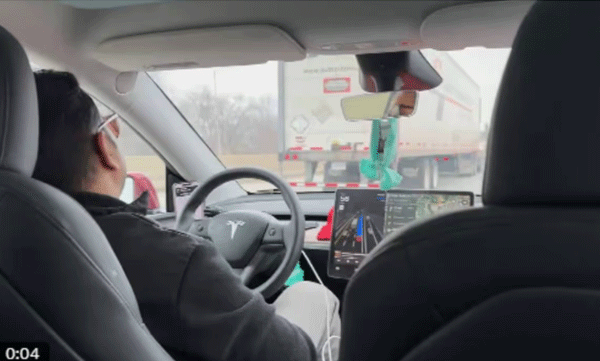 car-drives-itself-tesla-uber-driver-falls-asleep-mid-ride-viral-video